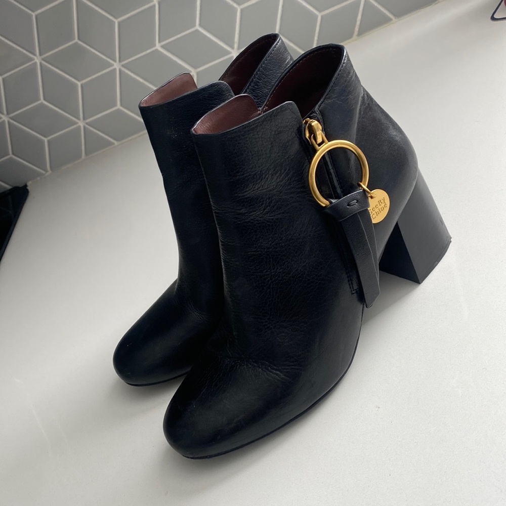 See by Chloe black booties with gold hardware